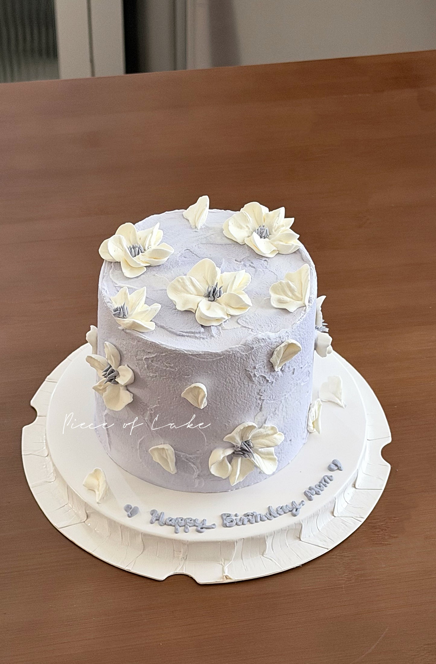 紫色简约裱花蛋糕